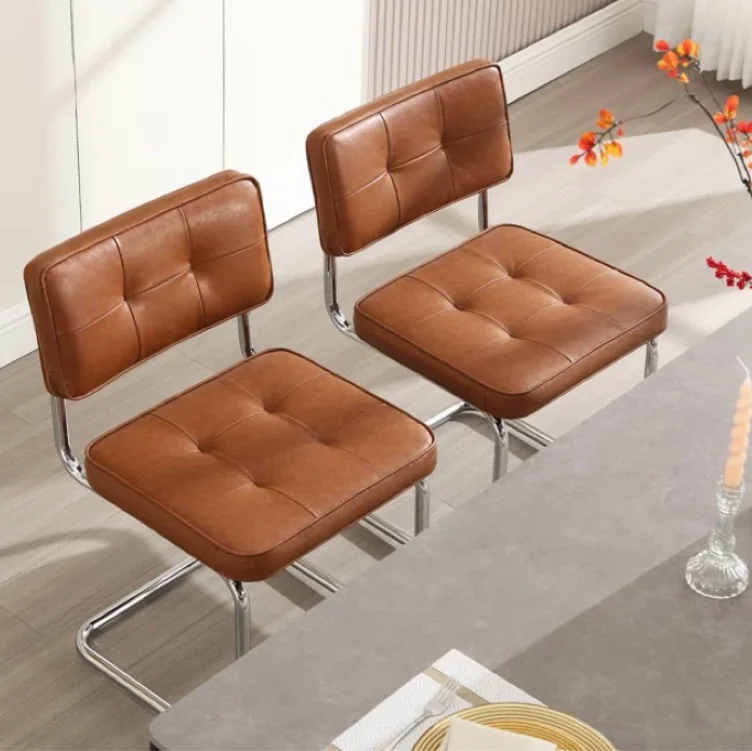 Corrigan Studio® Aveon 19.3" H Mid-Century Modern Tufted Faux Leather Side Dining Chair with Steel Frame