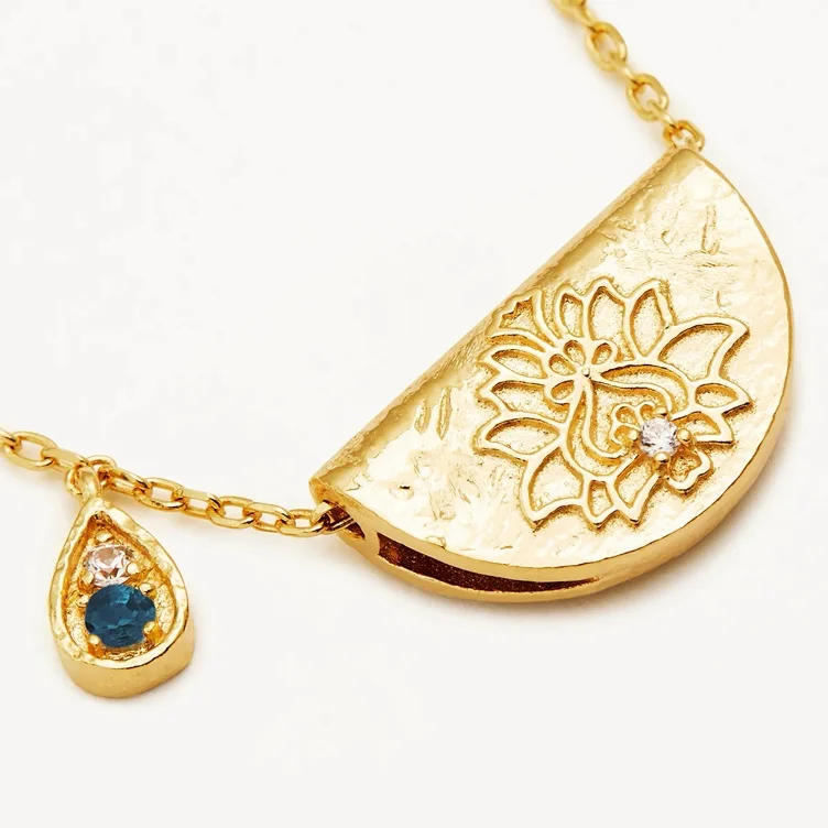 18k Gold Lotus Birthstone Necklace - December - Blue Topaz